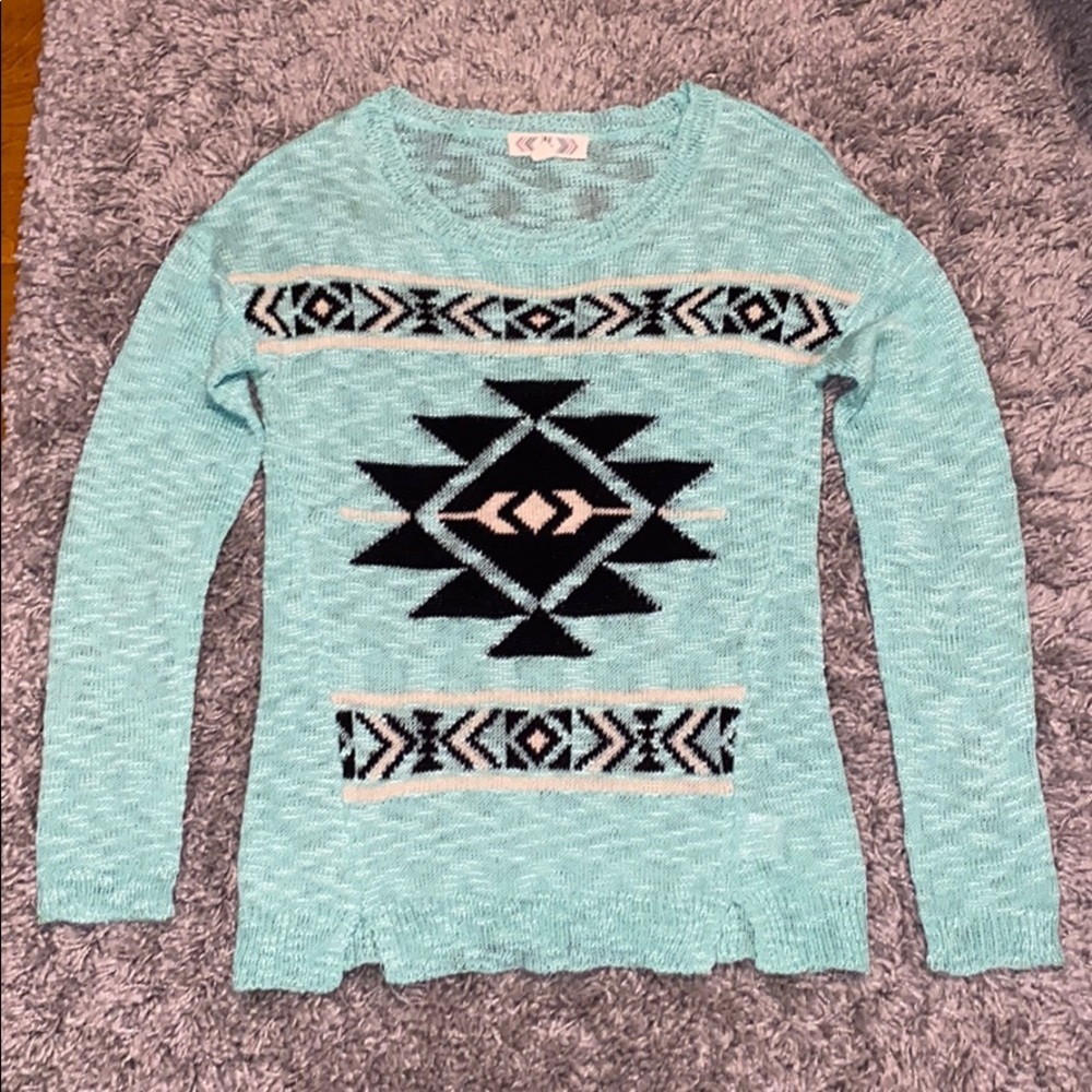 Mint green sweater.